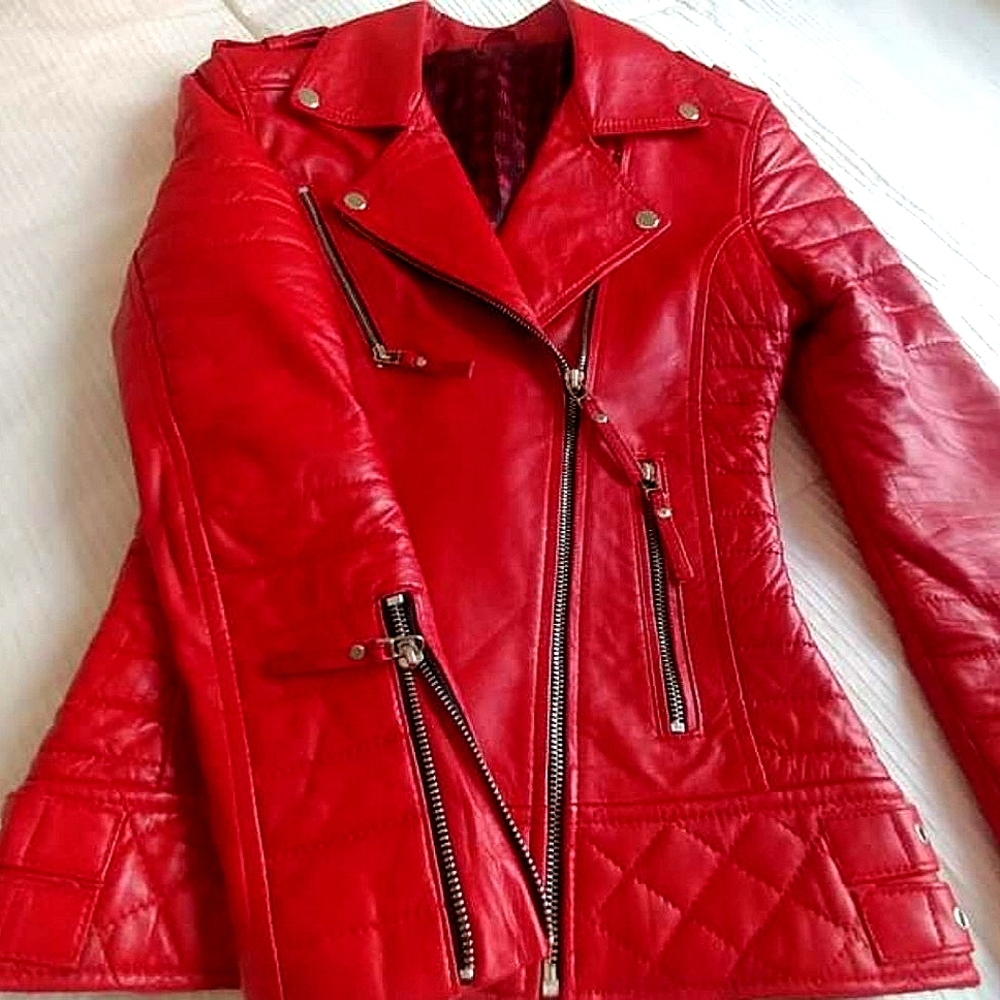 Red leather motorcycle jacket. England.